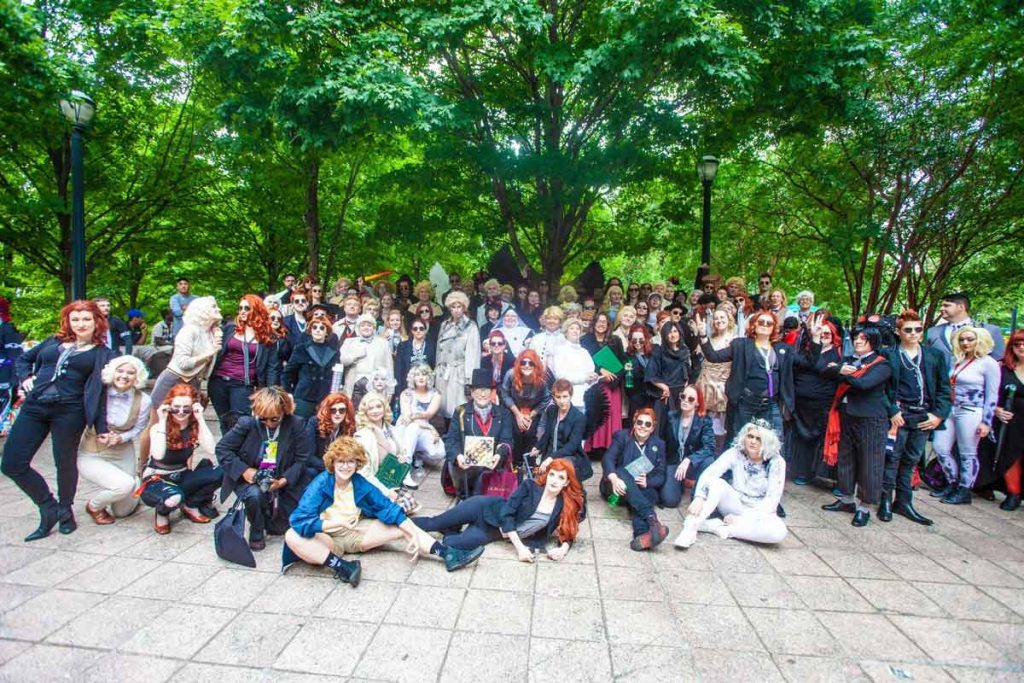 large group shot of a number of Good Omens costumers